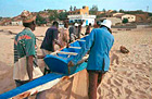 retour de péche sur la plage